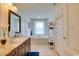 Bright bathroom with dual sinks, a soaking tub, and modern fixtures at 899 Kinlaw Ln., Conway, SC 29527