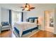 Cozy bedroom with a ceiling fan, a comfortable bed, and ample natural light at 899 Kinlaw Ln., Conway, SC 29527
