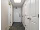 Bright hallway with carpet, leading to rooms and closets at 1105 S Ocean Blvd. # 252, Myrtle Beach, SC 29577