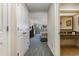 Hallway view of condo with access to bedroom and bathroom at 1105 S Ocean Blvd. # 252, Myrtle Beach, SC 29577