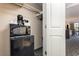 Small kitchen with microwave, coffee maker, and mini-fridge at 1105 S Ocean Blvd. # 252, Myrtle Beach, SC 29577