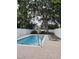 Relaxing swimming pool surrounded by lush landscaping at 114-A 11Th Ave. S, Surfside Beach, SC 29575