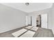 Spacious bedroom featuring neutral walls, carpeted floor, and natural light streaming in from a nearby window at 1199 Pyxie Moss Dr., Little River, SC 29566