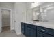 Bathroom featuring a double-sink vanity with a white countertop, and a walk-in closet at 1212 Nw Calabash Station Blvd., Calabash, NC 28467