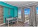 Bright dining area with ocean view and white table at 1605 S Ocean Blvd. # 1113, Myrtle Beach, SC 29577