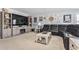 Spacious basement featuring a large TV, fireplace, and comfortable seating at 208 Switch Grass Ct., Myrtle Beach, SC 29579