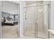 Glass enclosed shower with gray tile and built-in shelving at 208 Switch Grass Ct., Myrtle Beach, SC 29579
