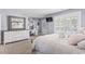 Bedroom with white dresser and large bed at 208 Switch Grass Ct., Myrtle Beach, SC 29579
