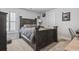 Bedroom with a dark-brown wooden bed frame at 208 Switch Grass Ct., Myrtle Beach, SC 29579