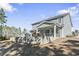 Gray house exterior with a patio, deck and backyard at 208 Switch Grass Ct., Myrtle Beach, SC 29579