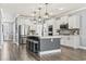 Modern kitchen with stainless steel appliances and white cabinets at 208 Switch Grass Ct., Myrtle Beach, SC 29579