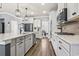 Open concept kitchen with white cabinets, granite counters, and island at 208 Switch Grass Ct., Myrtle Beach, SC 29579
