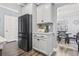 Modern kitchen with stainless steel appliances and white cabinets at 208 Switch Grass Ct., Myrtle Beach, SC 29579