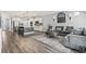 Open living space with kitchen, island, and gray sectional at 208 Switch Grass Ct., Myrtle Beach, SC 29579
