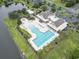 Community pool with a clubhouse and surrounding landscaping at 208 Switch Grass Ct., Myrtle Beach, SC 29579