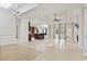 Open-concept living space featuring elegant tile flooring and plenty of room for entertaining guests at 2113 Clematis Ct., Myrtle Beach, SC 29579