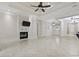 Bright living room featuring a fireplace, mounted TV, and an open layout with recessed lighting at 2113 Clematis Ct., Myrtle Beach, SC 29579
