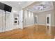 Spacious main bedroom with a tray ceiling, ceiling fan, and doorway to living room at 2113 Clematis Ct., Myrtle Beach, SC 29579