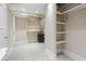 Walk-in closet with custom shelving units, providing ample storage space and organization at 2113 Clematis Ct., Myrtle Beach, SC 29579