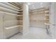 Spacious walk-in closet featuring ample shelving for organized storage of clothing and accessories at 2113 Clematis Ct., Myrtle Beach, SC 29579