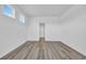 Bright bedroom with wood-look flooring and natural light at 234 Letha Dr, Longs, SC 29568