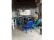 A tiki bar with bar seating, surf decor, and a variety of beverages on display at 4714 Woodland St., North Myrtle Beach, SC 29582