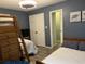 A bedroom featuring bunk beds, a single bed, and decor with a turtle theme at 4714 Woodland St., North Myrtle Beach, SC 29582
