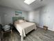 Relaxing bedroom featuring a king bed and blue accents at 4714 Woodland St., North Myrtle Beach, SC 29582
