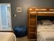 Bedroom featuring bunkbeds, a single bed, a blue beanbag, and crab wall decor at 4714 Woodland St., North Myrtle Beach, SC 29582