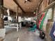 Entertainment space with a ping pong table, chairs, tiki decor, and sports flags at 4714 Woodland St., North Myrtle Beach, SC 29582
