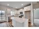 Modern kitchen with white cabinets, quartz countertops, and stainless steel appliances at 4979 Dupont Rd., Conway, SC 29526