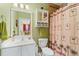 Small bathroom with shower/tub combo and white vanity at 5750 Oyster Catcher Dr. # 131, North Myrtle Beach, SC 29582