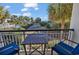 Relaxing balcony with ocean view and patio furniture at 601 Retreat Beach Circle # 124, Pawleys Island, SC 29585