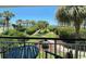 Balcony view of ocean, landscaping and resort amenities at 601 Retreat Beach Circle # 124, Pawleys Island, SC 29585