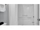 Bathroom with shower/tub combo and white tile at 601 Retreat Beach Circle # 124, Pawleys Island, SC 29585