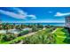 Aerial view of pool, grounds, and oceanfront at 601 Retreat Beach Circle # 328, Litchfield, SC 29585