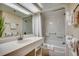 Clean bathroom with tub shower combination and updated vanity at 601 Retreat Beach Circle # 328, Litchfield, SC 29585