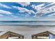 Beach access with wooden stairs and ocean view at 601 Retreat Beach Circle # 328, Litchfield, SC 29585