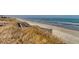 Elevated boardwalk offering scenic beach views at 601 Retreat Beach Circle # 328, Litchfield, SC 29585