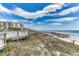 Beachfront view with boardwalk, dunes and ocean at 601 Retreat Beach Circle # 328, Litchfield, SC 29585
