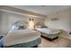 Guest bedroom with two twin-size beds and light decor at 601 Retreat Beach Circle # 328, Litchfield, SC 29585