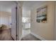 Bright hallway leading to kitchen and living areas at 601 Retreat Beach Circle # 328, Litchfield, SC 29585