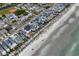 Aerial view showing home's location near beach and other houses at 612 S Ocean Blvd. # 104A, Surfside Beach, SC 29575