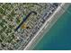 Aerial view showing home's location near beach and other houses at 612 S Ocean Blvd. # 104A, Surfside Beach, SC 29575