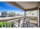 Oceanfront balcony with seating for three, offering stunning views at 612 S Ocean Blvd. # 104A, Surfside Beach, SC 29575