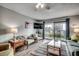 Living room with comfy seating and ocean view at 612 S Ocean Blvd. # 104A, Surfside Beach, SC 29575
