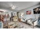 Spacious living room with comfy seating and ocean views at 612 S Ocean Blvd. # 104A, Surfside Beach, SC 29575