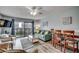 Living room with balcony access and coastal decor at 612 S Ocean Blvd. # 104A, Surfside Beach, SC 29575
