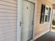 Exterior view of condo building with white door at 636 Waterway Village Blvd. # 17C, Myrtle Beach, SC 29579