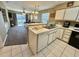Kitchen features white cabinets, appliances, and tile flooring at 636 Waterway Village Blvd. # 17C, Myrtle Beach, SC 29579